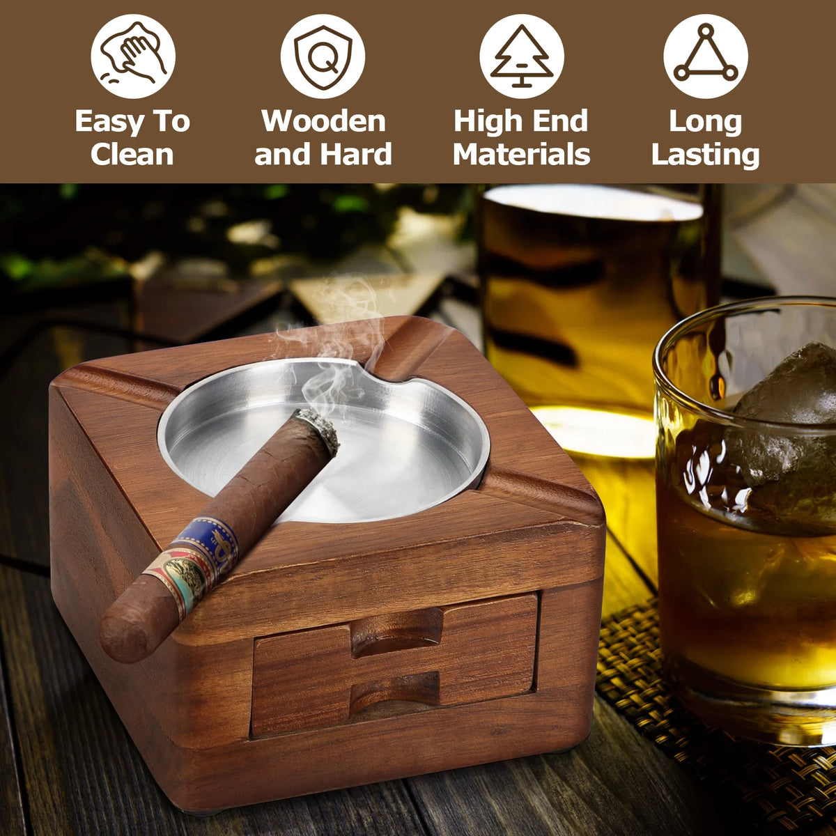 Wooden cigar ashtray with cutter stored in the side drawer on a home office desk